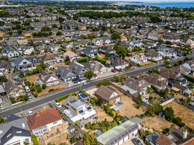 Aerial view of residential streets and gardens in the Mudeford area of Christchurch